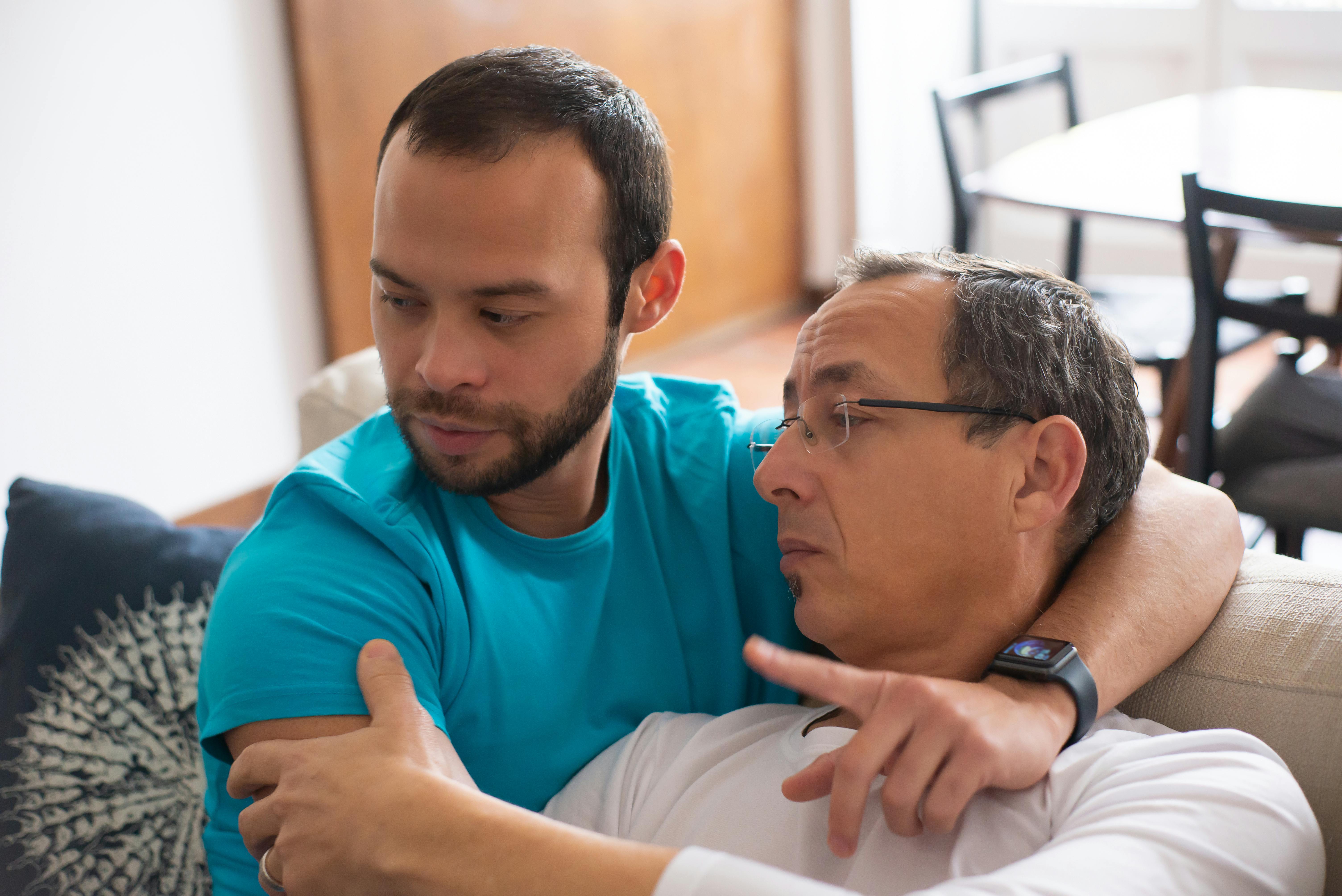 Adult child supporting an older parent at home